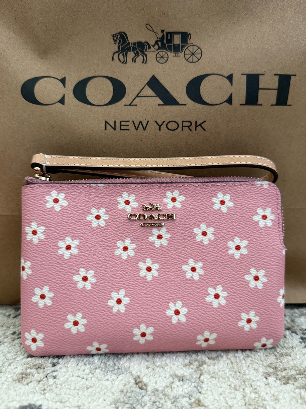 Coach Pink Wristlet with Gold Logo